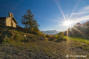 soleil couchant sur chapelle saint roch
